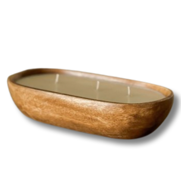 candle in wooden dough bowl